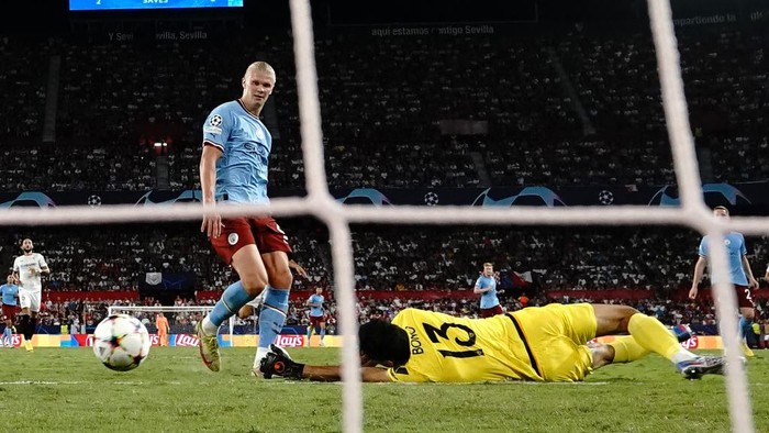 Manchester Citys Erling Haaland scores their sides third goal of the game during the UEFA Champions League Group G match at the Ramon Sanchez Pizjuan Stadium in Seville, Spain. Picture date: Tuesday September 6, 2022. (Photo by Nick Potts/PA Images via Getty Images)