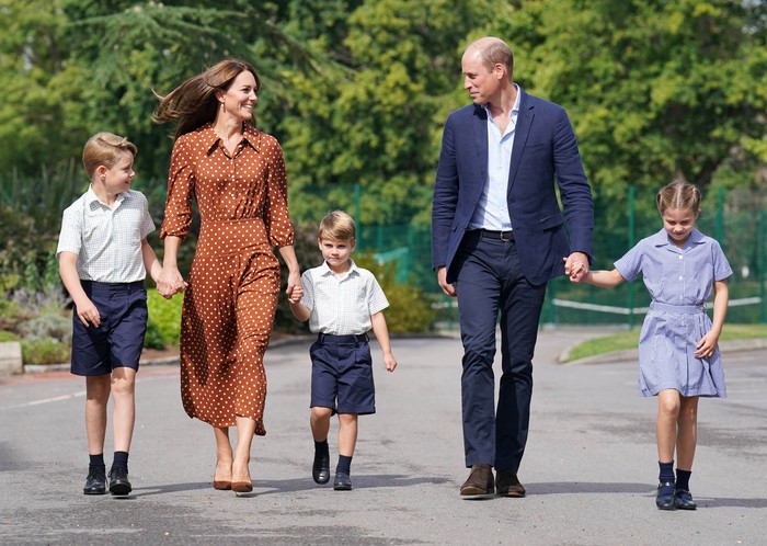 Britains Prince George, Princess Charlotte and Prince Louis, accompanied by their parents Prince William and Catherine, Duchess of Cambridge, arrive for a settling-in afternoon at Lambrook School, an annual event held to welcome new starters and their families the day before the start of the new school term, near Ascot in Berkshire, Britain, September 7, 2022. Jonathan Brady/Pool via REUTERS