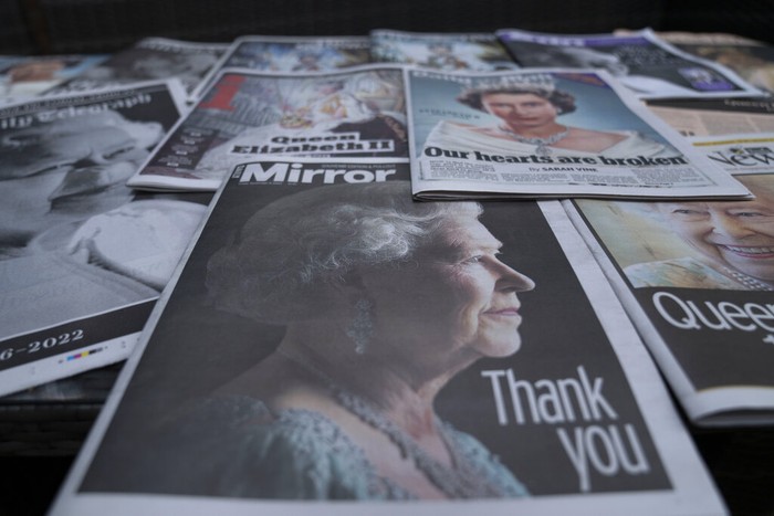 Britain Queen Newspapers devoted to the death of Queen Elizabeth II are seen in Manchester, England, Friday, Sept. 9, 2022. Queen Elizabeth II, Britain's longest-reigning monarch, died on Thursday Sept. 8 aged 96. (AP Photo/Jon Super)