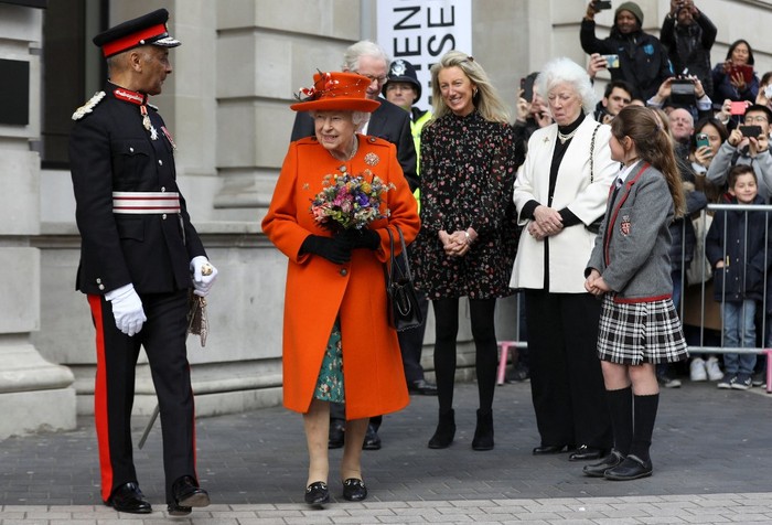 Britain's Queen Elizabeth II looks at an Enigma machine at the Smith Centre as Science Museum Director Ian Blatchford (C) looks on, during a visit to the Science Museum in London on March 7, 2019. (Photo by SIMON DAWSON / POOL / AFP)