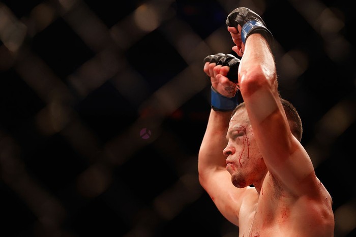GLENDALE, ARIZONA - JUNE 12: (R-L) Nate Diaz punches Leon Edwards of Jamaica in their welterweight fight during the UFC 263 event at Gila River Arena on June 12, 2021 in Glendale, Arizona. (Photo by Jeff Bottari/Zuffa LLC)