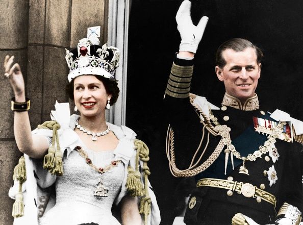 2nd June 1953:  Queen Elizabeth II in the coronation coach on her way to be crowned at Westminster Abbey. She is dressed as a peeress of the realm and wears the Diadem crown.