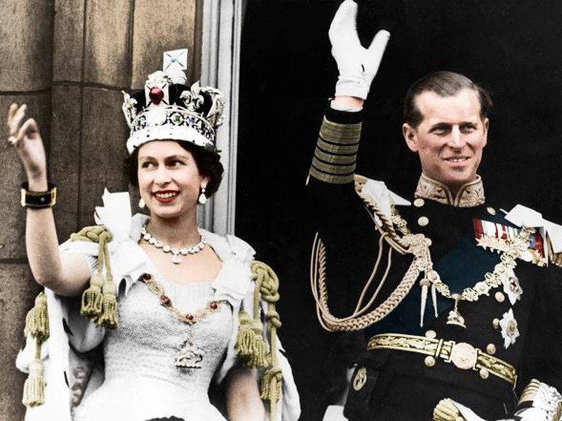 2nd June 1953:  Queen Elizabeth II in the coronation coach on her way to be crowned at Westminster Abbey. She is dressed as a peeress of the realm and wears the Diadem crown.