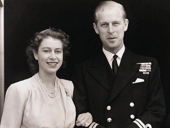 (Original Caption) 7/11/1947-London, England- Princess Elizabeth, Britain's future queen, and Lt. Philip Mountbatten shown at Buckingham Palace. On her engagement finger, the Princess wears a three-diamond ring, symbolic of her bethrotal. Photo was made July 10th when the royal lovers made their first public appearance following announcement of their engagement by King George.