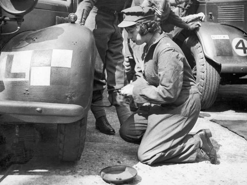 Princess Elizabeth learning basic car maintenance as a Second Subaltern in the A.T.S 12th April 1945. (Photo by Daily Mirror/Mirrorpix/Mirrorpix via Getty Images)
