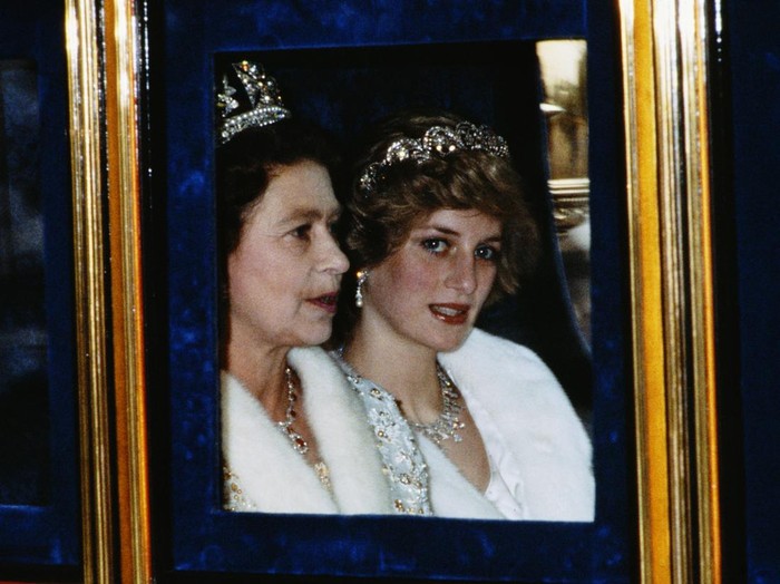 The Princess of Wales and the Queen attend the Opening of Parliament in London, November 1982. Diana is wearing a white fur coat and the Spencer tiara. (Photo by Terry Fincher/Princess Diana Archive/Getty Images)