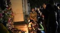 Seluruh warga Inggris pun berduka. Foto: AP/Frank Augstein