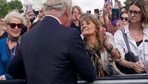 Jenny Assiminios is seen early awaiting for King Charles III before kissing him.
Yui Mok/Pool Photo via AP