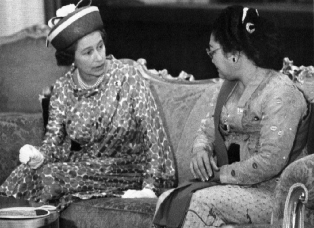 Britain's Queen Elizabeth II, left, talks with Siti Suharto, the First Lady of Indonesia and wife of the Indonesian President, during a coffee morning in Jakarta, Indonesia, on March 22, 1974. (AP Photo)