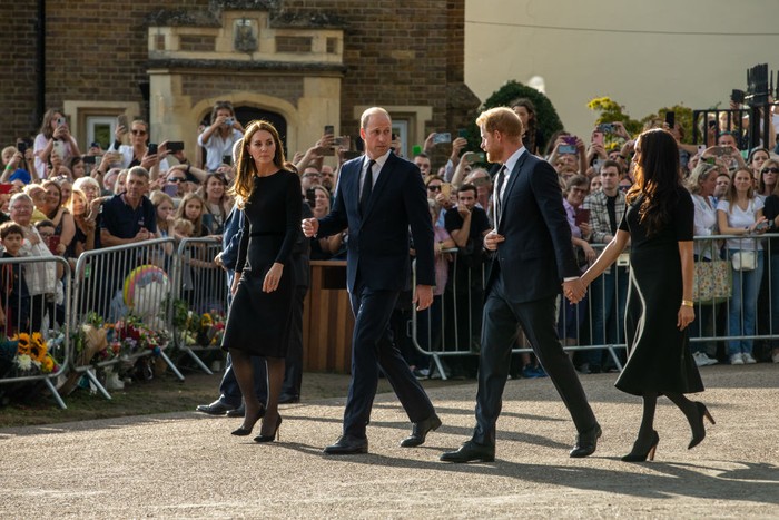 Prince William and Catherine, the new Prince and Princess of Wales, accompanied by Prince Harry and Meghan, the Duke and Duchess of Sussex, proceed to greet well-wishers outside Windsor Castle on 10th September 2022 in Windsor, United Kingdom. Queen Elizabeth II, the UKs longest-serving monarch, died at Balmoral aged 96 on 8th September 2022 after a reign lasting 70 years. (photo by Mark Kerrison/In Pictures via Getty Images)