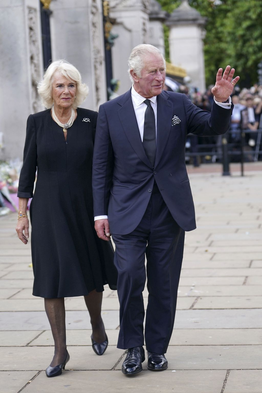 LONDON, ENGLAND - SEPTEMBER 10: Camilla, Queen Consort meets well-wishers as she returns to Clarence House from Buckingham Palace along the Mall during a impromptu walkabout following the death of Queen Elizabeth II on September 10, 2022 in London, United Kingdom. His Majesty The King is proclaimed at the Accession Council in the State Apartments of St James's Palace, London. The Accession Council, attended by Privy Councillors, is divided into two parts. In part I, the Privy Council, without The King present, proclaims the Sovereign and part II where The King holds the first meeting of His Majesty's Privy Council. The Accession Council is followed by the first public reading of the Principal Proclamation read from the balcony overlooking Friary Court at St James's Palace. The Proclamation is read by the Garter King of Arms, accompanied by the Earl Marshal, other Officers of Arms and the Serjeants-at-Arms. (Photo by Victoria Jones - WPA Pool/Getty Images)