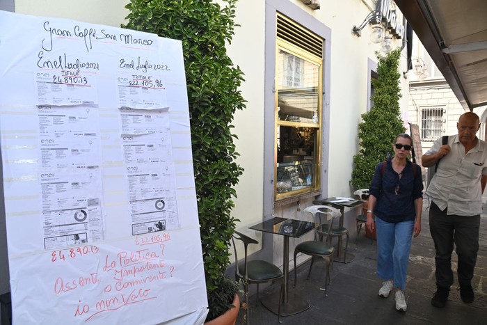 1243158328 FLORENCE, ITALY - SEPTEMBER 10: A photo shows a bill on display outside a restaurant as restaurant, cafe and bar owners seek urgent help from government after seeing their energy costs triple from a year earlier due to the ongoing energy crisis in Florence, Italy on September 10, 2022. Struggling to cope with soaring energy prices, bar and restaurant owners across Italy have decided to share their pain with their customers, putting their âunbearableâ gas and electricity bills on display. The nationwide âBollette in Vetrinaâ (Bills on Display) initiative was launched by Fipe-Confcommercio â the Italian association of retail and catering businesses â with the aim of making customers aware of the grim reality: energy bills have tripled compared to a year ago. The heavy toll from the ongoing energy crisis â a consequence of the Ukrainian war and Russiaâs cutting of gas supplies to Europe â is forcing small and medium-sized retailers to choose between imposing price increases on their clients or shutting down. (Photo by Carlo Bressan/Anadolu Agency via Getty Images)
