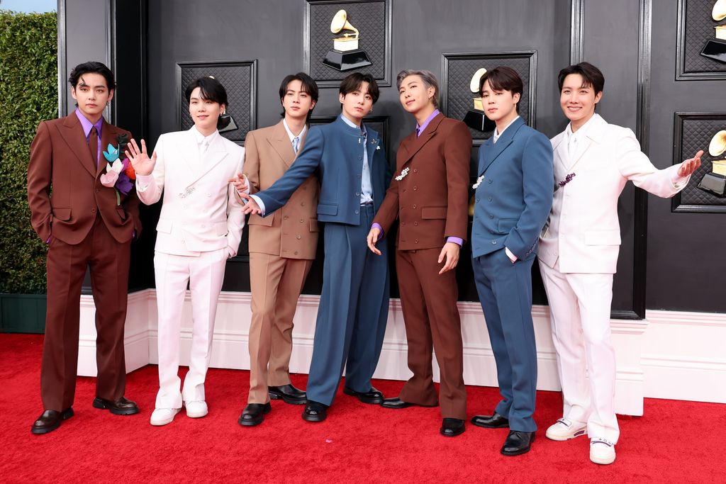 LAS VEGAS, NEVADA - APRIL 03: V, Suga, Jin, Jungkook, RM, Jimin and J-Hope of BTS attends the 64th Annual GRAMMY Awards at MGM Grand Garden Arena on April 03, 2022 in Las Vegas, Nevada. (Photo by Amy Sussman/Getty Images)