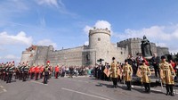 Upacara tersebut dimeriahkan oleh Band Coldstream Guards, State Trumpeters dari Band of the Household Cavalry. (Richard Heathcote/Getty Images)