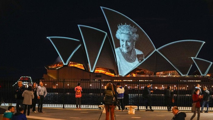 FILE - The Sydney Opera House is illuminated with a portrait of Queen Elizabeth II in Sydney, Australia, on Sept. 9, 2022. Many regarded Australians’ respect and affection for the late Queen Elizabeth II as the biggest obstacle to the country becoming a republic with its own head of state. Now after her death and with a pro-republic Labor Party government in power, Australia’s constitutional ties to the British monarchy will again be open to first-order debate for the first time since change was rejected at a 1999 referendum.(AP Photo/Mark Baker, File)