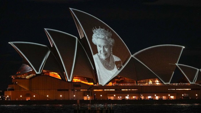 FILE - The Sydney Opera House is illuminated with a portrait of Queen Elizabeth II in Sydney, Australia, on Sept. 9, 2022. Many regarded Australians’ respect and affection for the late Queen Elizabeth II as the biggest obstacle to the country becoming a republic with its own head of state. Now after her death and with a pro-republic Labor Party government in power, Australia’s constitutional ties to the British monarchy will again be open to first-order debate for the first time since change was rejected at a 1999 referendum.(AP Photo/Mark Baker, File)