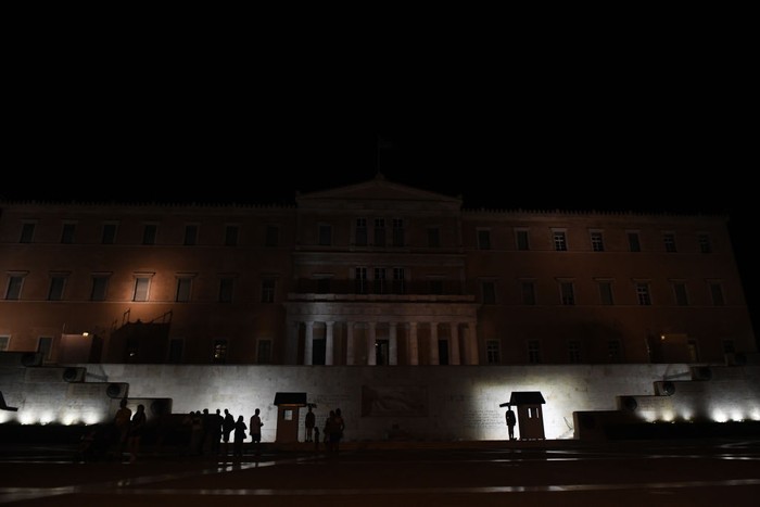 1243173489 ATHENS, GREECE - SEPTEMBER 12: The lighting of the Greek Parliament building is reduced to a minimum due to the austerity measures taken within the framework of the fight against the energy crisis, in Athens, Greece, on September 12. 2022. (Photo by Dimitris Lampropoulos/Anadolu Agency via Getty Images)