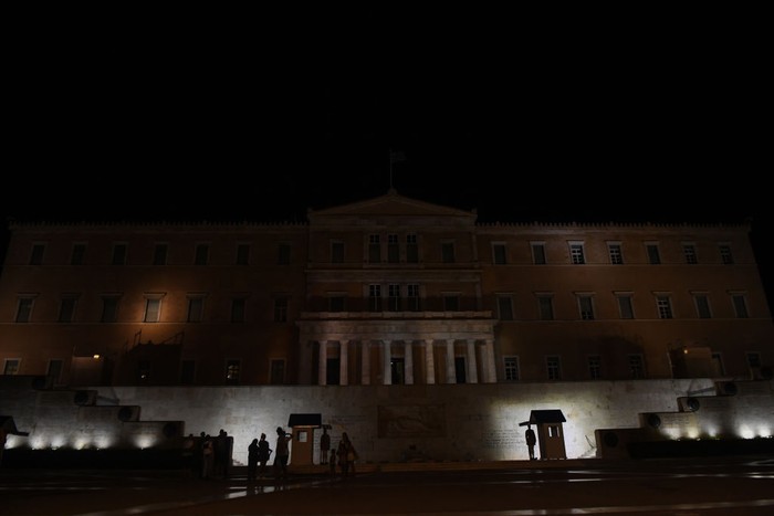 1243173489 ATHENS, GREECE - SEPTEMBER 12: The lighting of the Greek Parliament building is reduced to a minimum due to the austerity measures taken within the framework of the fight against the energy crisis, in Athens, Greece, on September 12. 2022. (Photo by Dimitris Lampropoulos/Anadolu Agency via Getty Images)