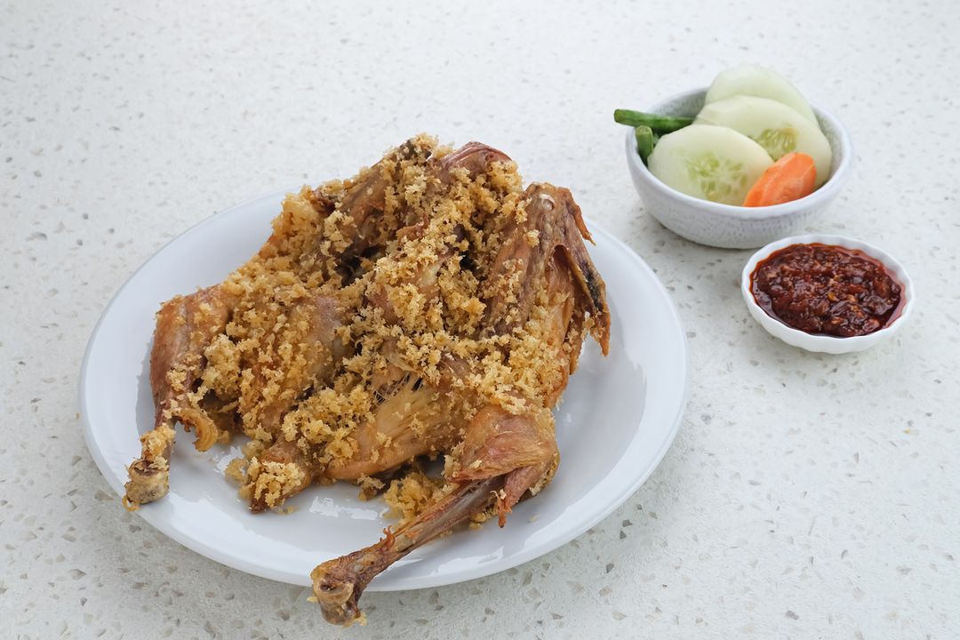 Ayam Goreng Kremes, Indonesian cuisine, fried chicken that cooked with special spice, combined with crispy fried flour (kremes).