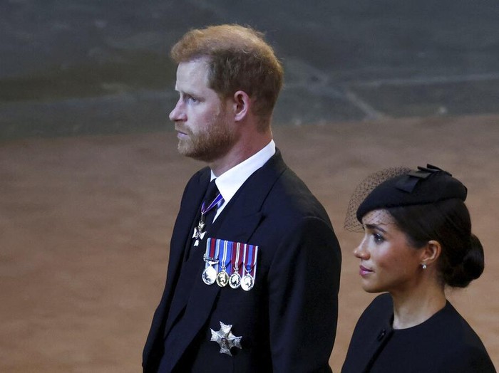Britains Kate, Princess of Wales, from left, Prince William, Meghan, Duchess of Sussex and Prince Harry stand in Westminster Hall after participating in the procession of the coffin of Queen Elizabeth, London, Wednesday, Sept. 14, 2022. The Queen will lie in state in Westminster Hall for four full days before her funeral on Monday Sept. 19. (AP Photo/Gregorio Borgia, Pool)