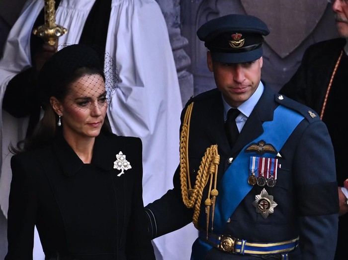 LONDON, ENGLAND - SEPTEMBER 14:  Catherine, Princess of Wales and Prince William, Prince of Wales leave after a service for the reception of Queen Elizabeth IIs coffin at Westminster Hall, on September 14, 2022 in London, United Kingdom. Queen Elizabeth IIs coffin is taken in procession on a Gun Carriage of The Kings Troop Royal Horse Artillery from Buckingham Palace to Westminster Hall where she will lay in state until the early morning of her funeral. Queen Elizabeth II died at Balmoral Castle in Scotland on September 8, 2022, and is succeeded by her eldest son, King Charles III. (Photo by Ben Stansall - WPA Pool/Getty Images)