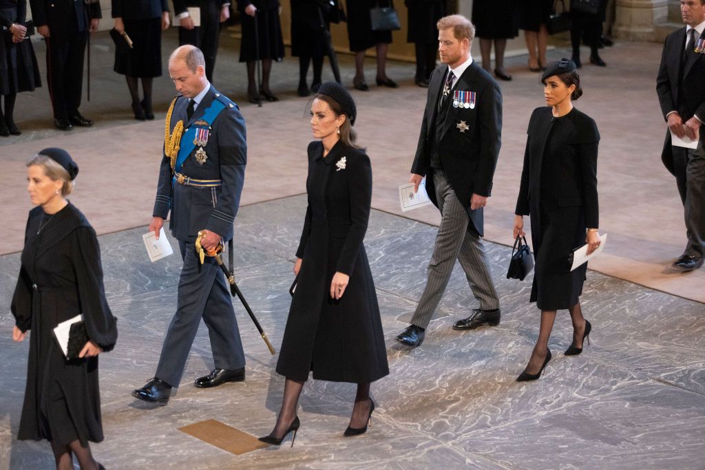 LONDON, ENGLAND - SEPTEMBER 14: Prince William, Prince of Wales, Catherine, Princess of Wales, Harry, Duke of Sussex and Meghan, Duchess of Sussex arrive as the coffin bearing the body of Her majesty Queen Elizabeth II completes its Journey from Buckingham Palace to Westminster Hall accompanied by King Charles III and other members of the Royal Family, on September 14, 2022 in London, England. (Photo Darren Fletcher - WPA Pool/Getty Images)