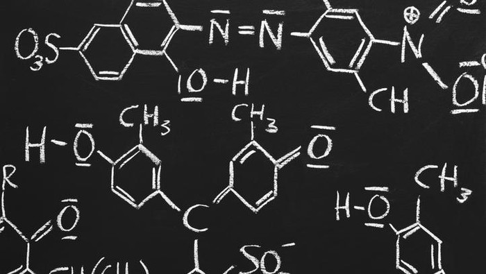 chemical structures drawn on a blackboard