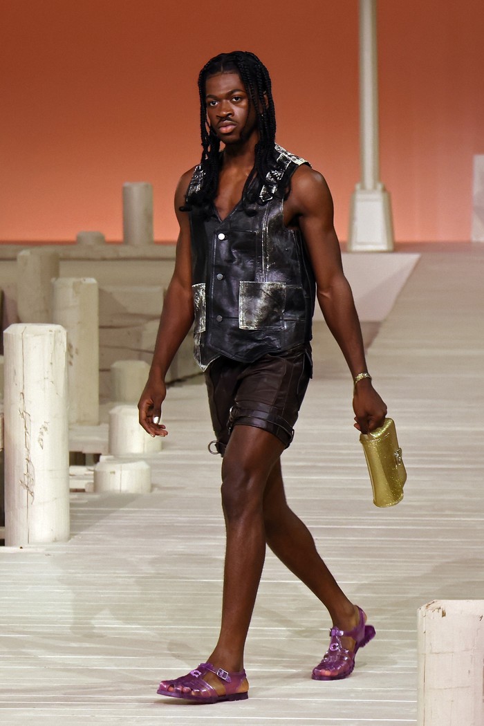 NEW YORK, NEW YORK - SEPTEMBER 12: Lil Nas X walks the runway at the Coach S/S 2023 Fashion Show during New York Fashion Week at Park Avenue Armory on September 12, 2022 in New York City. (Photo by Taylor Hill/FilmMagic)