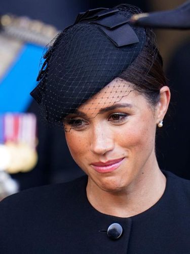 LONDON, ENGLAND - SEPTEMBER 14: The Duchess of Sussex leaves Westminster Hall, London after the coffin of Queen Elizabeth II was brought to lie in state ahead of her funeral on Monday, on September 14, 2022 in London, England (Photo Danny Lawson - WPA Pool/Getty Images)