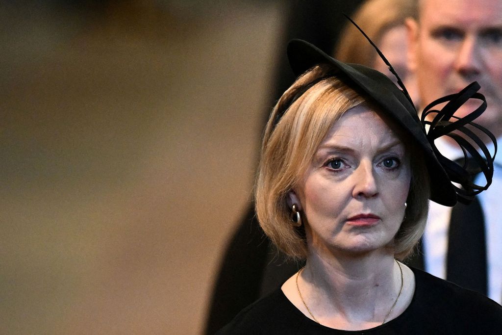 Britain's Prime Minister Liz Truss leaves after a service for the reception of Queen Elizabeth II's coffin at Westminster Hall, in the Palace of Westminster in London on September 14, 2022, OLI SCARFF/Pool via REUTERS