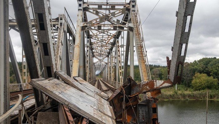 The destroyed bridge over the river Siverskyi Donets on the way to the liberated Balakliya, Kharkiv region, on September 14, 2022. (Photo by Oleksandr Khomenko/NurPhoto via Getty Images)