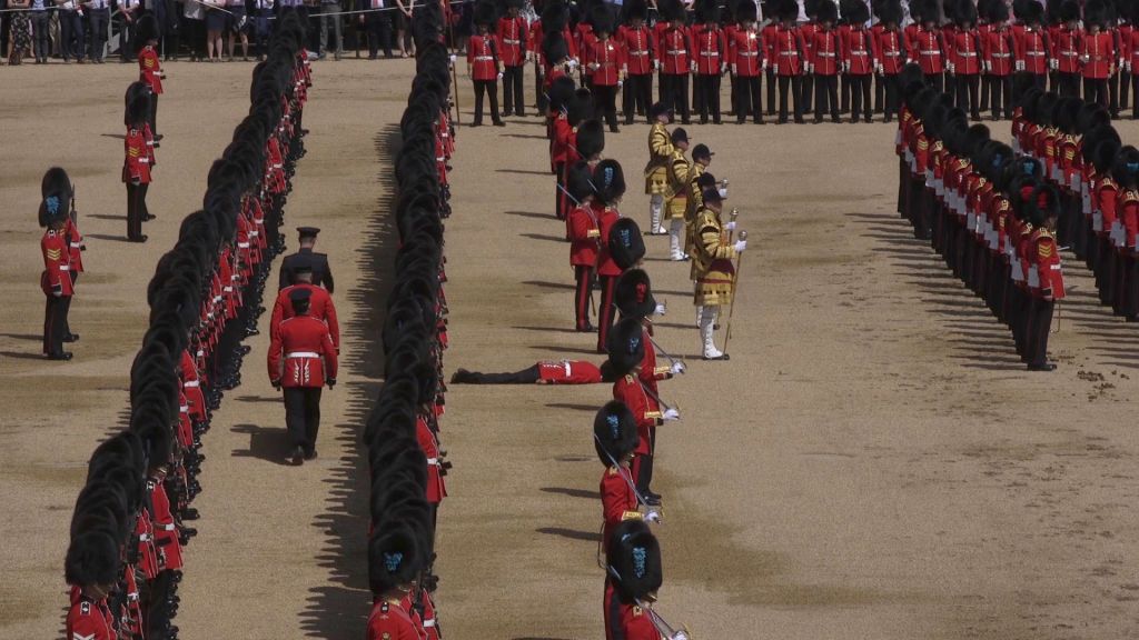 A Guardsman lies prone after fainting during the Trooping the Colour ceremony at Horse Guards Parade, central London, as the Queen celebrates her official birthday. (Photo by PA/PA Images via Getty Images)