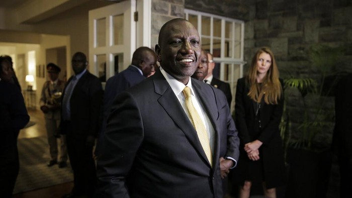 Kenya's new president William Ruto speaks to the media after signing the book of condolence for Queen Elizabeth II at the residence of Britain's High Commissioner, in Nairobi, Kenya Wednesday, Sept. 14, 2022. The coffin of Queen Elizabeth II left Buckingham Palace in London for the last time Wednesday, borne on a horse-drawn carriage and saluted by cannons and the tolling of Big Ben. (AP Photo/Brian Inganga)
