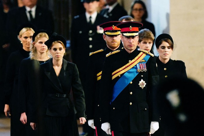 LONDON, ENGLAND - SEPTEMBER 17: Prince William, Prince of Wales, Prince Harry, Duke of Sussex, Princess Eugenie of York, Princess Beatrice of York, Peter Phillips, Zara Tindall, Lady Louise Windsor, James, Viscount Severn (obscured) arrive to hold a vigil in honour of Queen Elizabeth II at Westminster Hall on September 17, 2022 in London, England. Queen Elizabeth IIs grandchildren mount a family vigil over her coffin lying in state in Westminster Hall. Queen Elizabeth II died at Balmoral Castle in Scotland on September 8, 2022, and is succeeded by her eldest son, King Charles III. (Photo by Ian Vogler-WPA Pool/Getty Images)