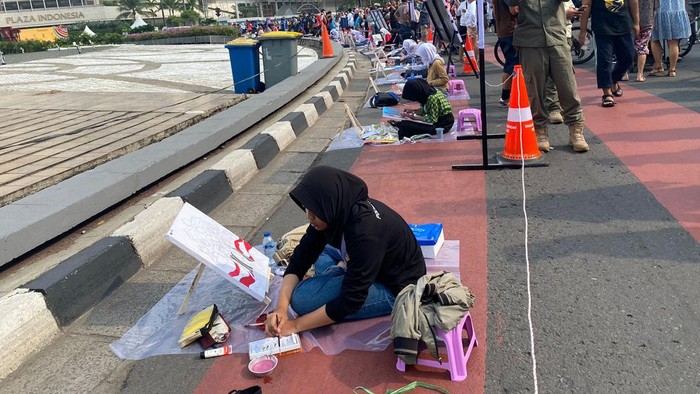 Hari Lalu Lintas Bhayangkara Ke-67, Ratusan Siswa Lomba Lukis di Bundaran HI (Karin-detikcom)