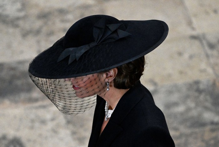 LONDON, ENGLAND - SEPTEMBER 19: Meghan, Duchess of Sussex arrives at Westminster Abbey for The State Funeral of Queen Elizabeth II on September 19, 2022 in London, England. Elizabeth Alexandra Mary Windsor was born in Bruton Street, Mayfair, London on 21 April 1926. She married Prince Philip in 1947 and ascended the throne of the United Kingdom and Commonwealth on 6 February 1952 after the death of her Father, King George VI. Queen Elizabeth II died at Balmoral Castle in Scotland on September 8, 2022, and is succeeded by her eldest son, King Charles III.  (Photo by Christopher Furlong/Getty Images)