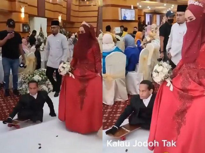 Pasangan pengantin viral di media sosial. Pasangan pengantin viral di media sosial.