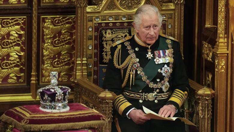 FILE - Prince Charles reads the Queens speech next to her crown during the State Opening of Parliament, at the Palace of Westminster in London, Tuesday, May 10, 2022. In retrospect, it seems Queen Elizabeth II was preparing us all along for her death. Whether it was due to age, ill health or a sense that the end was near, she spent much of the last two years tying up loose ends, making sure the family firm would keep ticking along. (AP Photo/Alastair Grant, Pool, File)