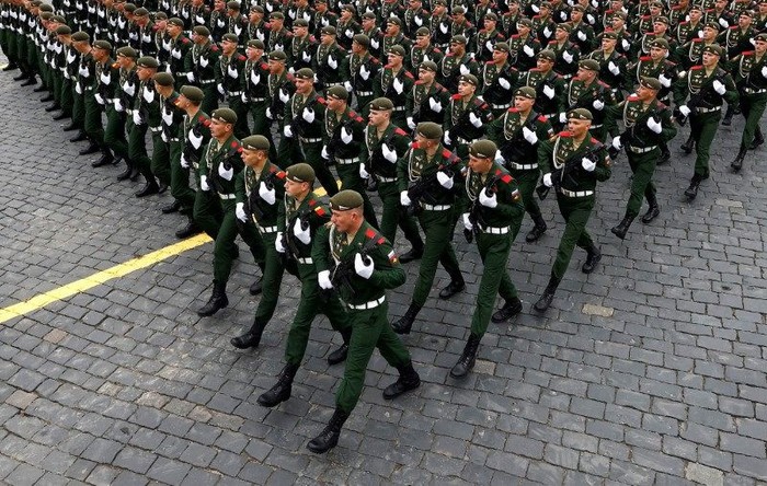 Russian service members march during a military parade on Victory Day, which marks the 76th anniversary of the victory over Nazi Germany in World War Two, in Red Square in central Moscow, Russia May 9, 2021. REUTERS/Maxim Shemetov/File Photo