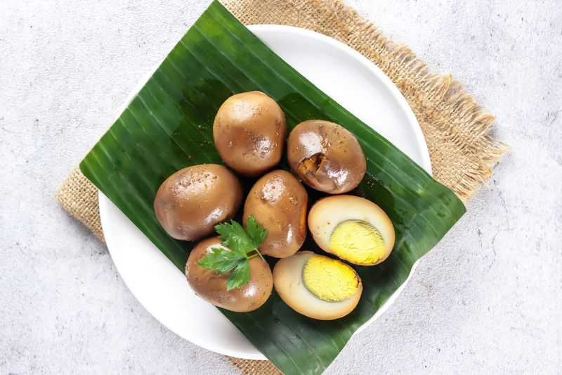Telur Bacem. Egg braised in sweet soy sauce. A popular side dish for Soto and Pindang Kudus.in