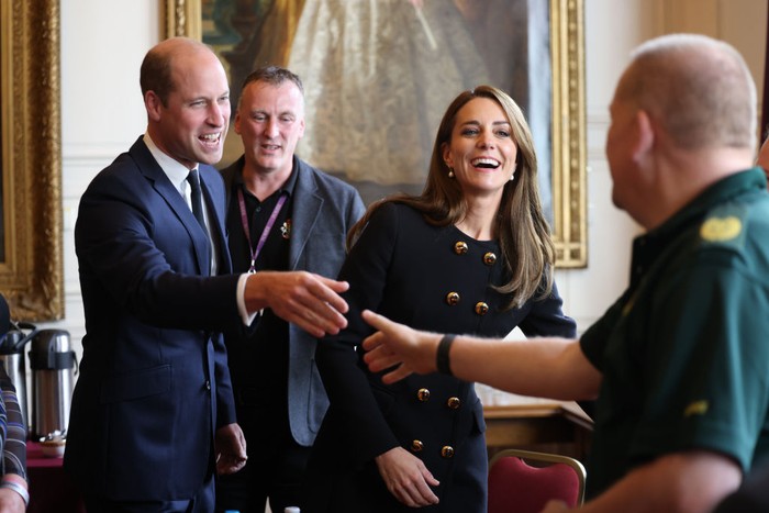 1243422812 WINDSOR, ENGLAND - SEPTEMBER 22: Prince William, Prince of Wales and Catherine, Princess of Wales visit the Windsor Guildhall to thank volunteers and operational staff involved in her Majesty Queen Elizabeth II's funeral on September 22, 2022 in Windsor, United Kingdom. (Photo by Ian Vogler-WPA Pool/Getty Images)