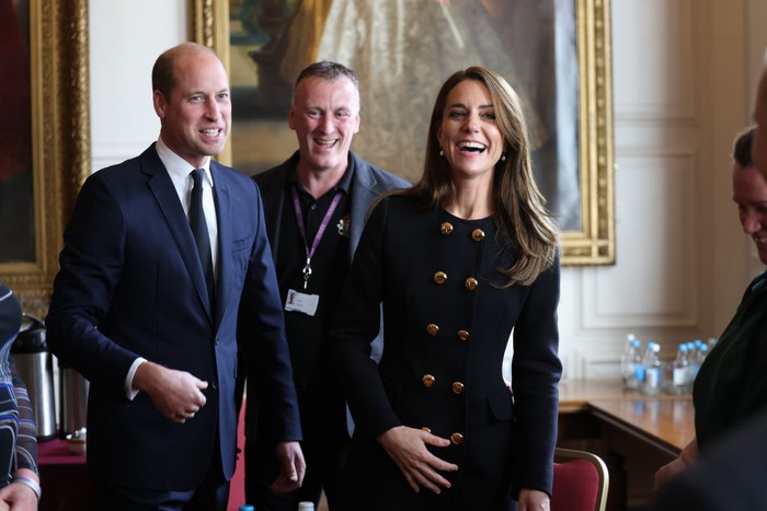 1243422812 WINDSOR, ENGLAND - SEPTEMBER 22: Prince William, Prince of Wales and Catherine, Princess of Wales visit the Windsor Guildhall to thank volunteers and operational staff involved in her Majesty Queen Elizabeth II's funeral on September 22, 2022 in Windsor, United Kingdom. (Photo by Ian Vogler-WPA Pool/Getty Images)