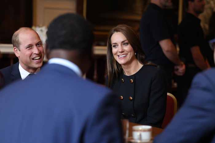 WINDSOR, ENGLAND - SEPTEMBER 22:  Prince William, Prince of Wales and Catherine, Princess of Wales visit the Windsor Guildhall to thank volunteers and operational staff involved in her Majesty Queen Elizabeth II's funeral on September 22, 2022 in Windsor, United Kingdom.  (Photo by Ian Vogler-WPA Pool/Getty Images)