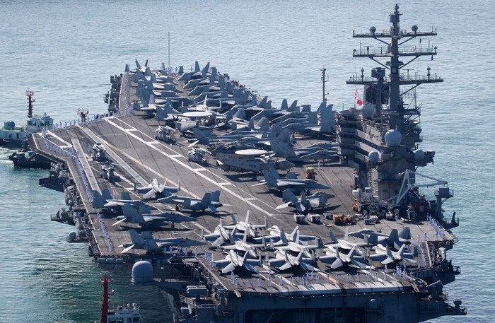 Fighter jets sit on the deck of U.S. Navy aircraft carrier USS Ronald Reagan which is anchored at a port in Busan, South Korea, September 23, 2022.      Yonhap via REUTERS   ATTENTION EDITORS - THIS IMAGE HAS BEEN SUPPLIED BY A THIRD PARTY. SOUTH KOREA OUT. NO RESALES. NO ARCHIVE.