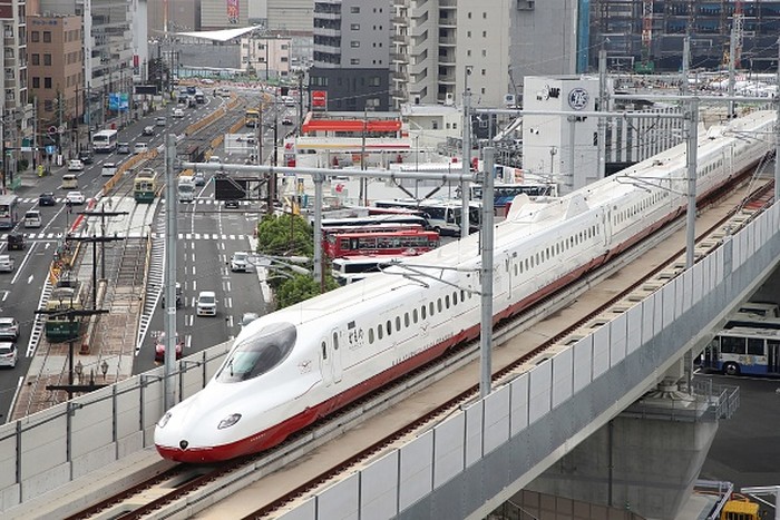 The new shinkansen, or bullet train, arrives at Nagasaki station on the first day of operations on Japans Kyushu island on September 23, 2022. - The new Nishi Kyushu Shinkansen Line is just 66 kms (41 miles) long, and links the hot springs town of Takeo-Onsen in Saga prefecture with the city of Nagasaki. - Japan OUT (Photo by JIJI PRESS / AFP) / Japan OUT (Photo by STR/JIJI PRESS/AFP via Getty Images)