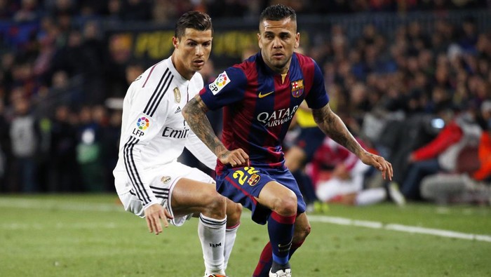 BARCELONA - jmarch 22- SPAIN: Dani Alves and Cristiano Ronaldo in the match between FC Barcelona and Real Madrid, for the week 28 of the Liga BBVA, played at the Camp Nou, on march 22, 2015. Photo: Joan Valls/Urbanandsport/Cordon Press -- (Photo by Urbanandsport/NurPhoto) (Photo by NurPhoto/NurPhoto via Getty Images)
