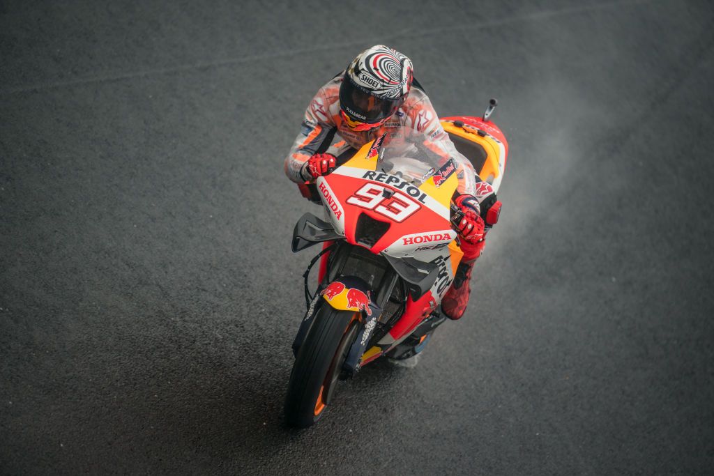 MOTEGI, JAPAN - SEPTEMBER 24: Marc Marquez of Spain and Repsol Honda Team rides through the rain during the qualifying session of the MotoGP Motul Grand Prix of Japan at Twin Ring Motegi on September 24, 2022 in Motegi, Japan. (Photo by Steve Wobser/Getty Images)