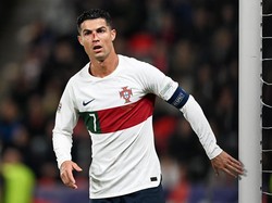 Perjuangan Cristiano Ronaldo dan Timnas Portugal berbuah manis dengan skor akhir 4-0 untuk Selecao das Quinas. Portugal pun kukuh di puncak klasemen Grup B dengan 10 poin. Foto: Getty Images/Thomas Eisenhuth