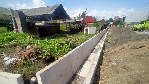 Drainase yang baru dipasang di Banjar Munduk, Desa Pengambengan, Kecamatan Negara, Jembrana, Bali, Minggu (25/9/2022)
