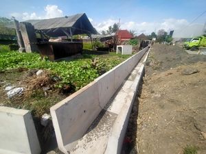 Warga Pengambengan Lega, Pemukiman Langganan Banjir Dibangun Drainase